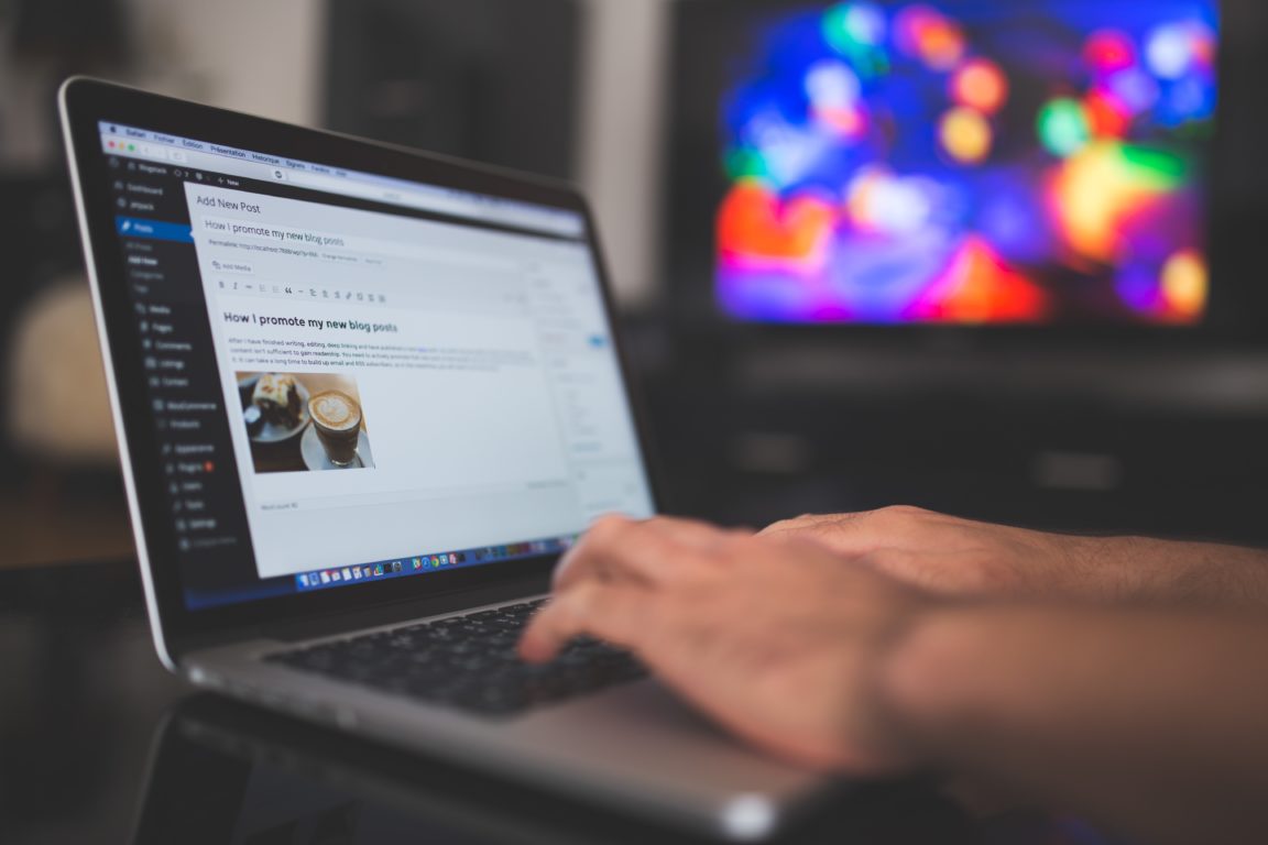 Digital marketing Executive works on a Laptop