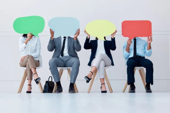 People depicting Tone of Voice having speech bubbles over their faces.